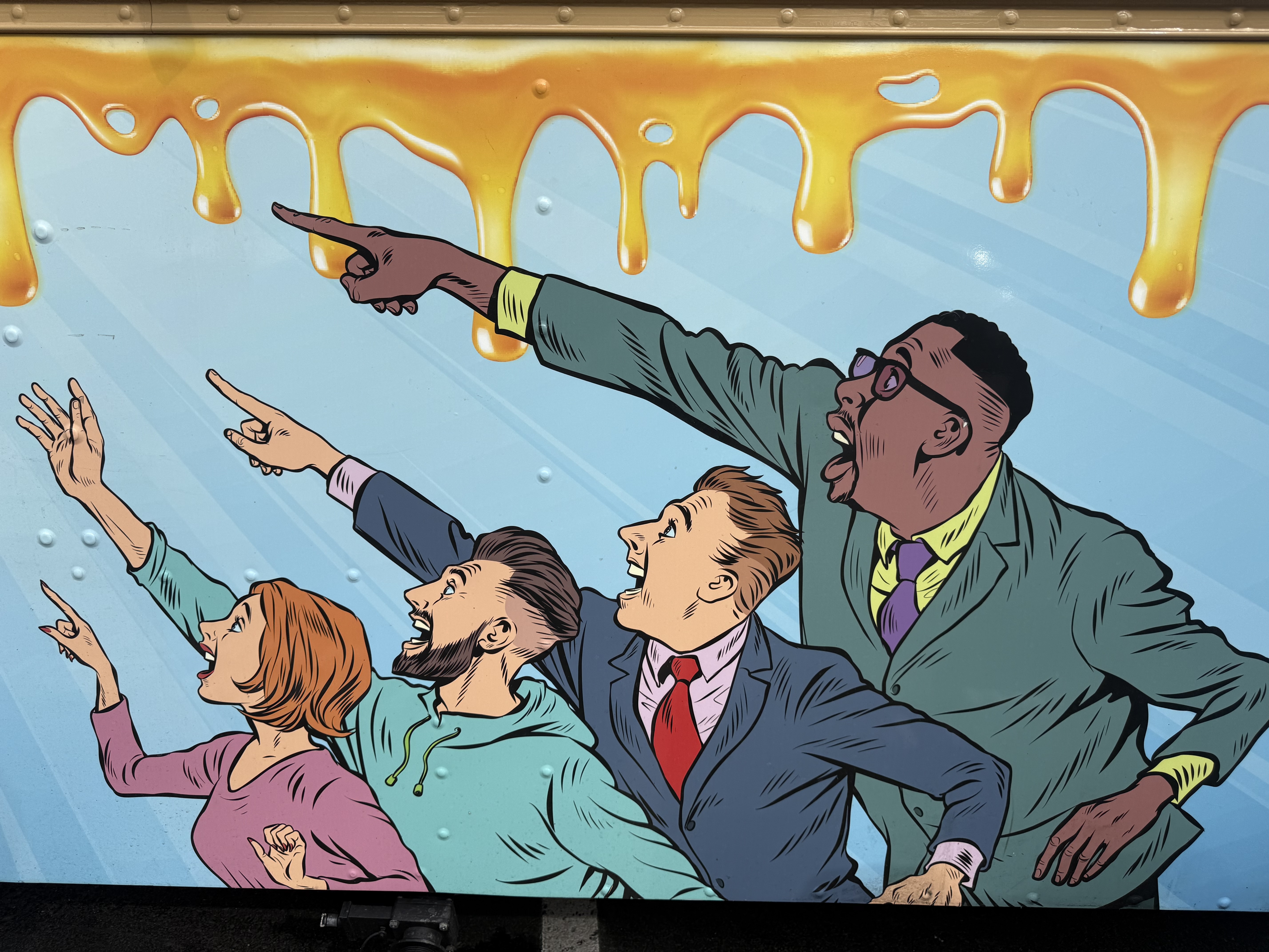 Comic book style crowd artwork on Juicy Shawarma truck